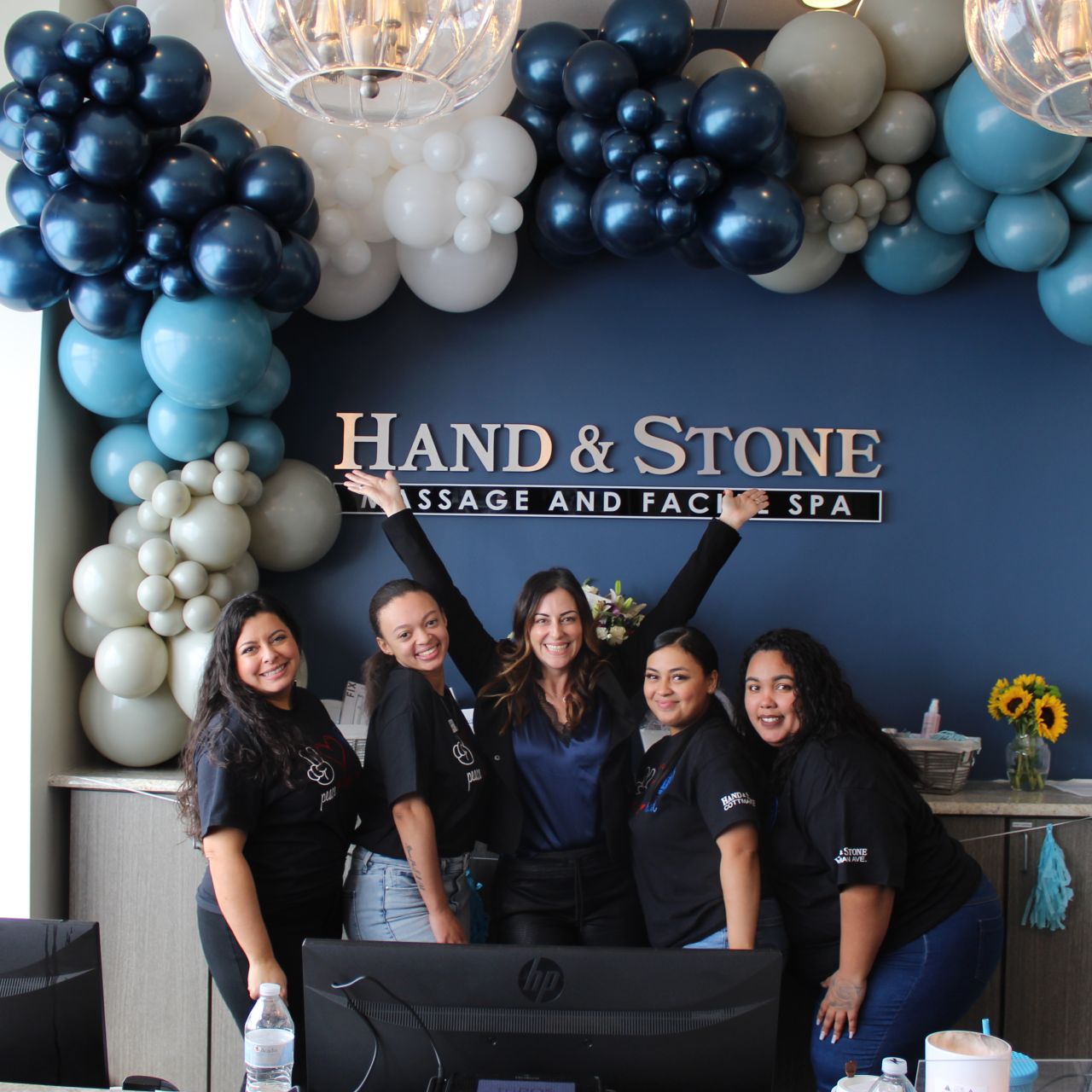 Hand & Stone Massage and Facial Spa ad